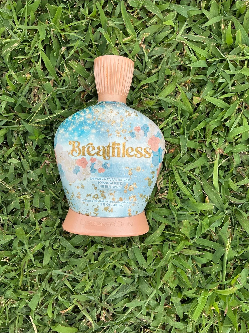 Breathless Shimmer Bronzer Lotion — Peach & Blue Radiance